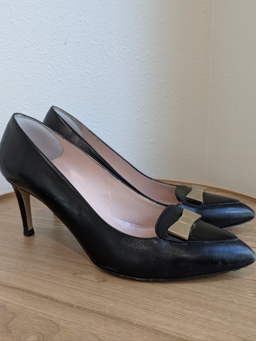 Kate Spade Classic Black Leather Pointed-Toe Pumps with Gold Accent